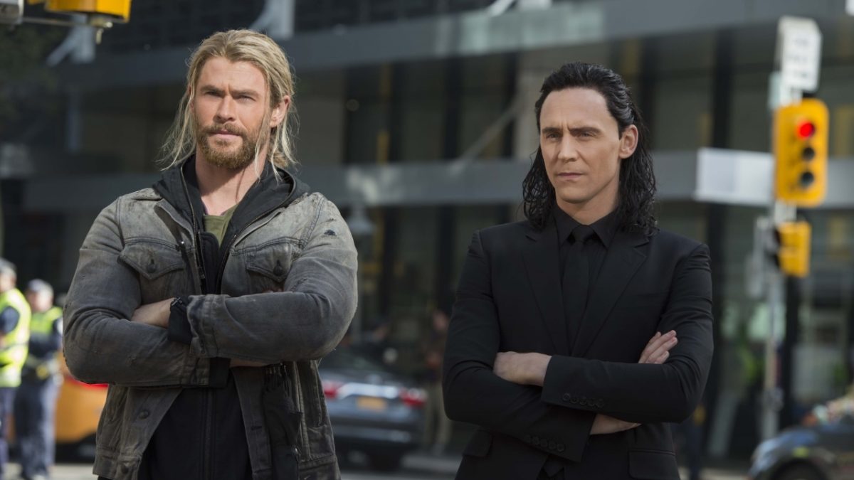 Thor and Loki in Thor: Ragnarok have their arms crossed. 