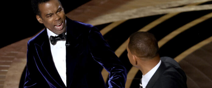 Watch: Will Smith slaps Chris Rock on stage at the 2022 Oscars