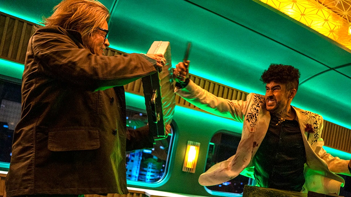 A still from ’Bullet Train’ showing Brad Pitt and Hirosyoki Sanada in character during a fight scene.