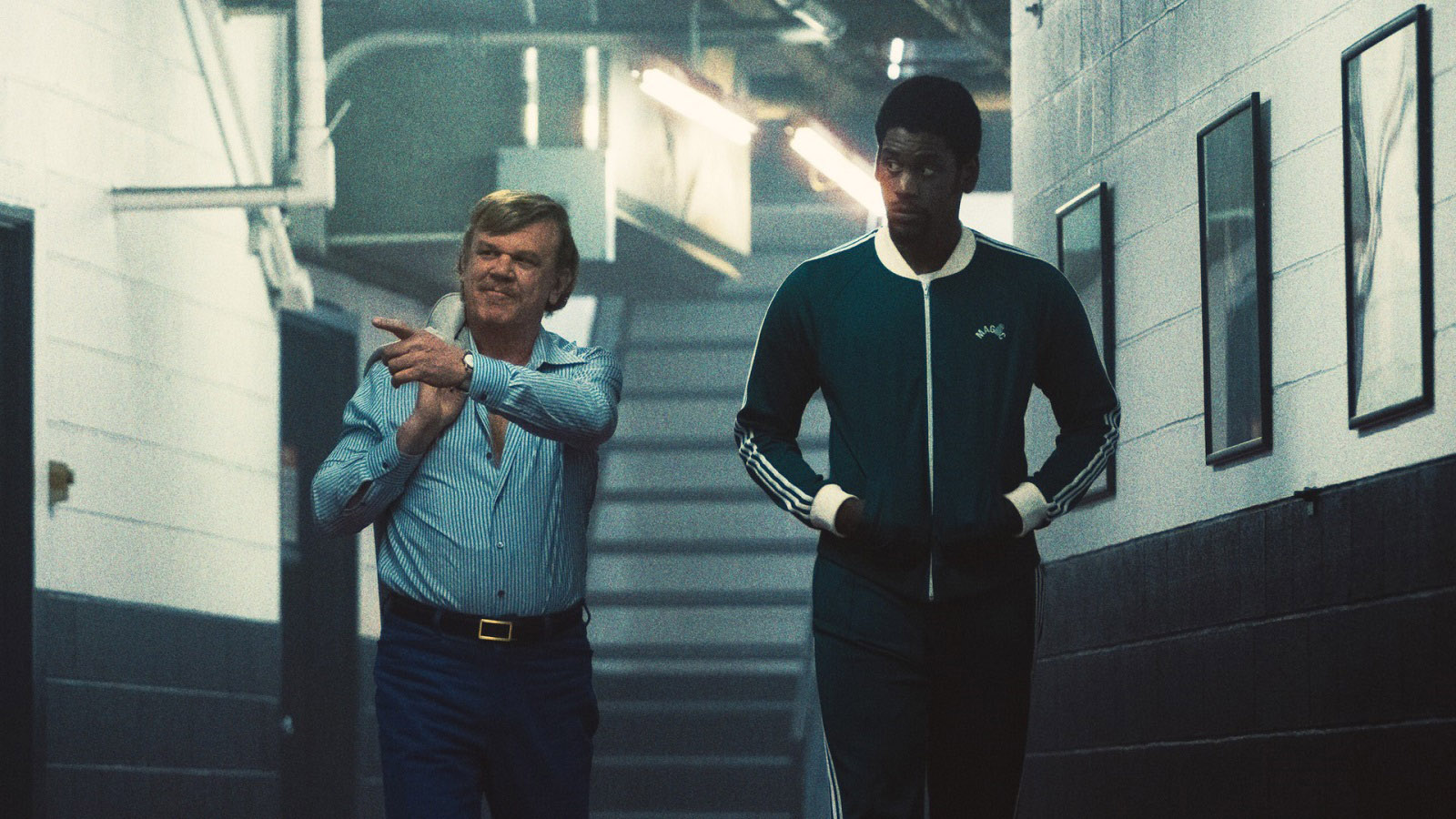 John C. Reilly as Jerry Buss & Quincy Isaiah as Magic Johnson in 'Winning Time'