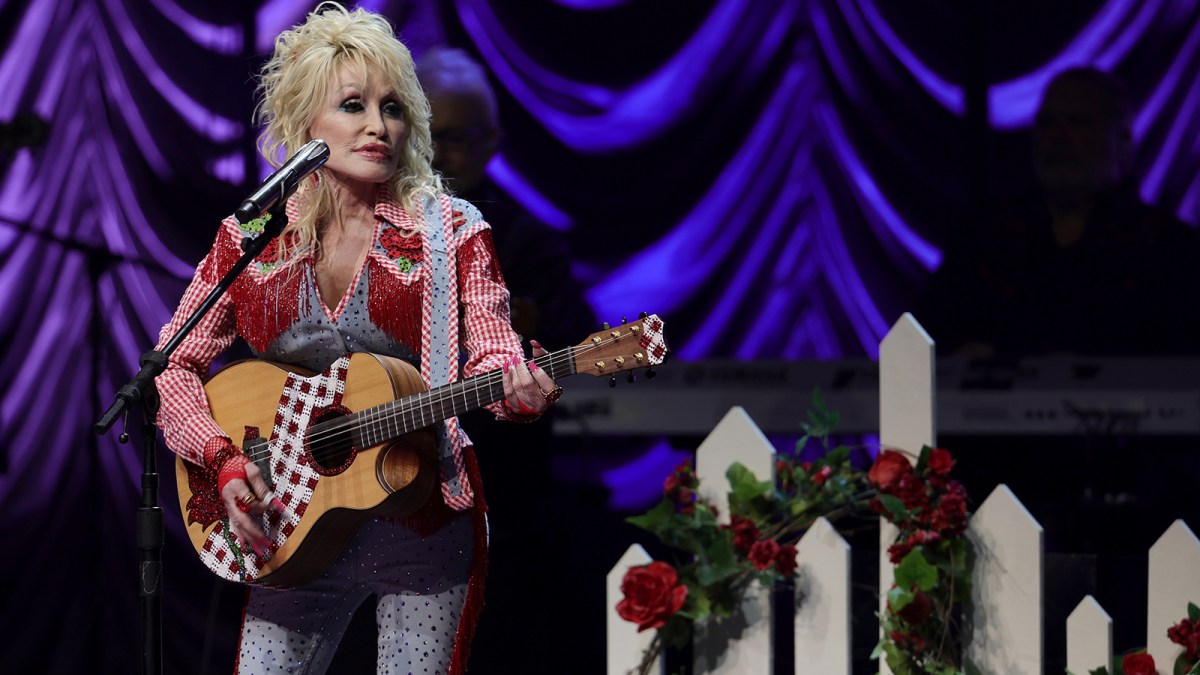 photo of dolly parton performing for story on reconsidering rock and roll hall of fame nomination