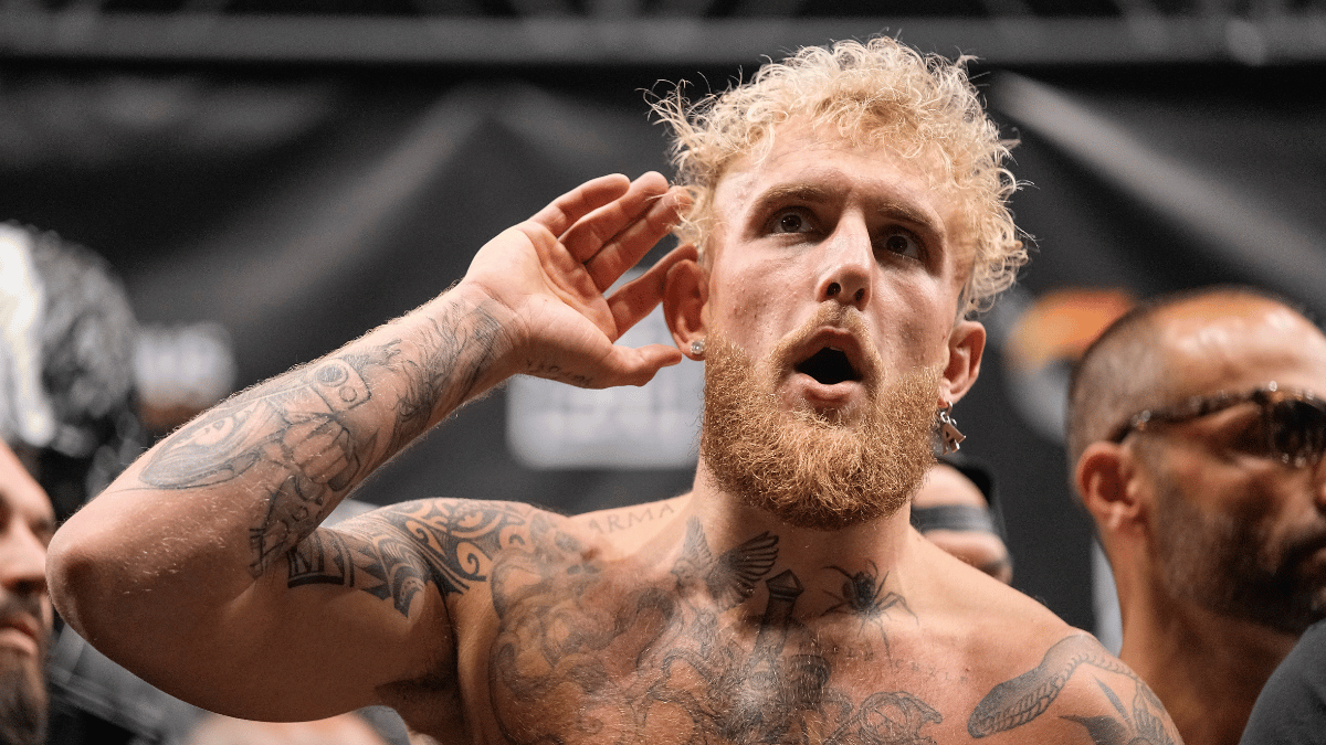 Jake Paul gestures to the audience during weigh-ins before his fight against Nate Diaz at American Airlines Center on August 04, 2023 in Dallas, Texas.