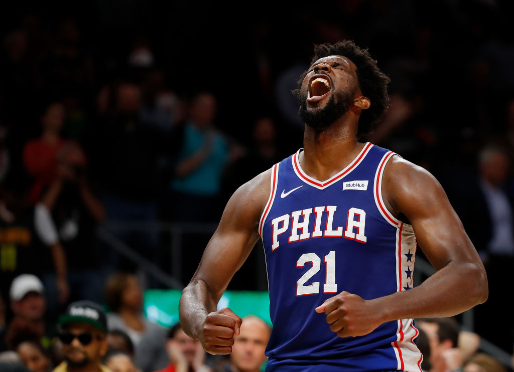 Joel Embiid reacts during a 76ers game.