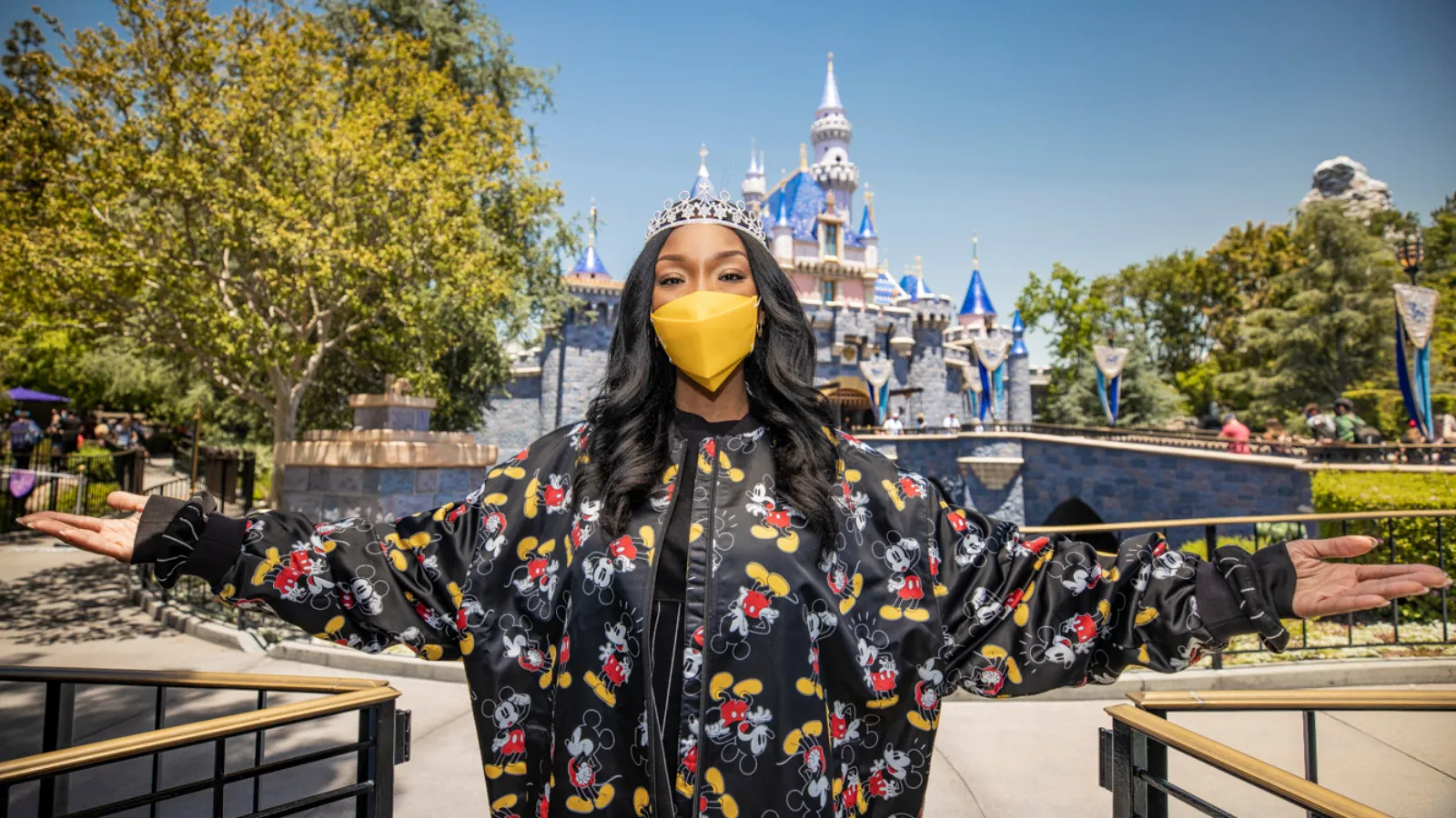 Brandy, poses in front of Sleeping Beauty Castle in Disneyland Park on May 23, 2021 in Anaheim, California.