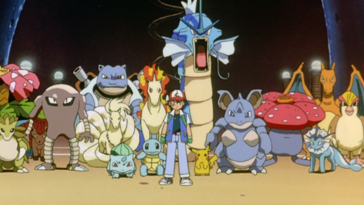 Ash standing with different Pokémon