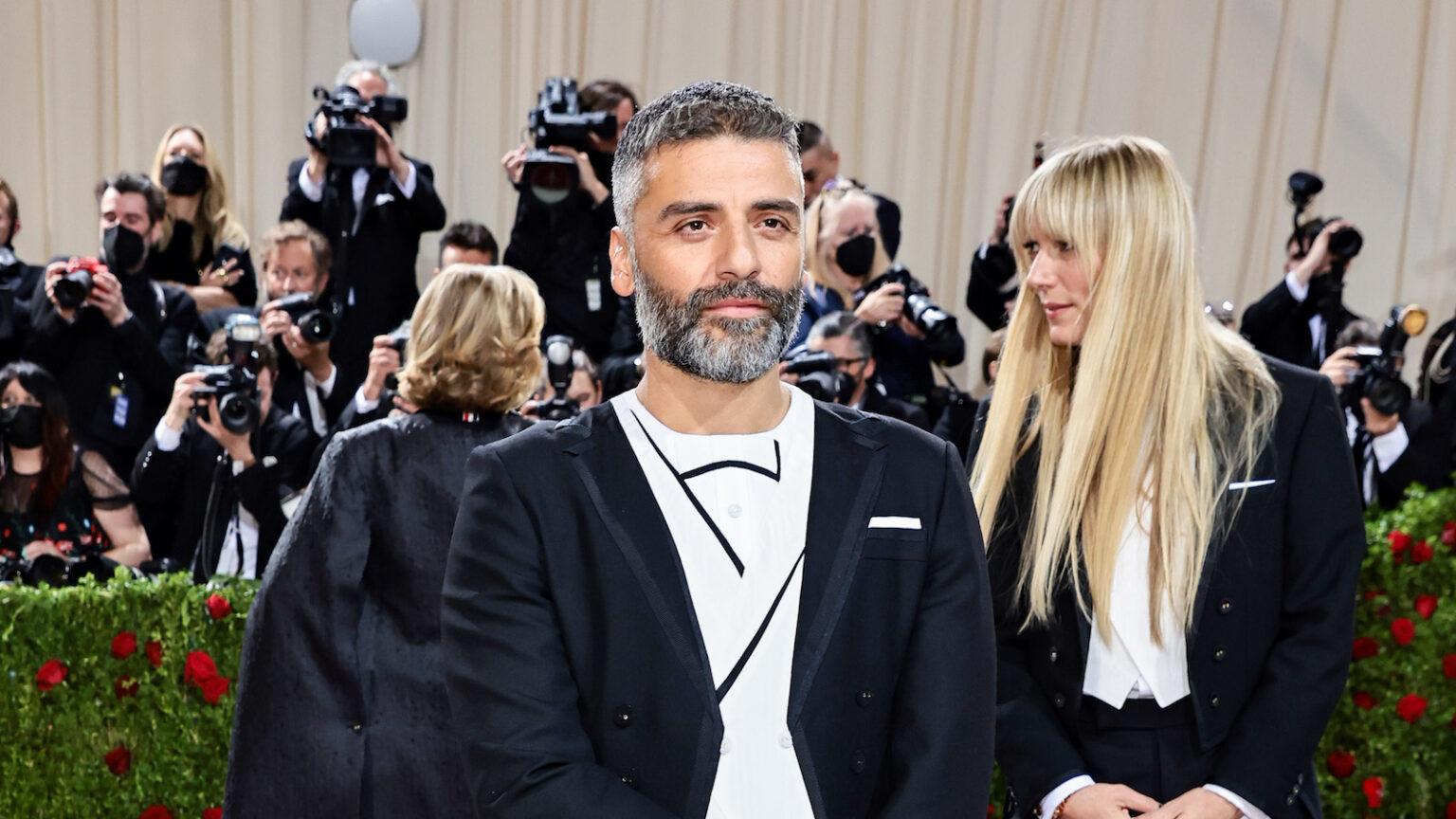 Oscar Isaac's kills the Met Gala Red Carpet in Thom Browne Dress