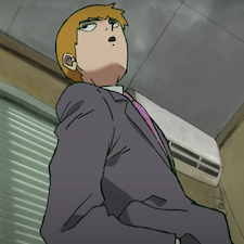 Arataka in a grey suit and pink tie