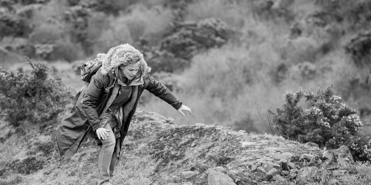 Bella (Maxine Peake) treks through a monochrome wilderness in 'Black Mirror' episode 'Metalhead.' 