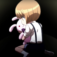 Chihiro holding onto a teddy bear and looking sad