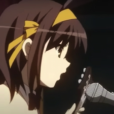 Haruhi singing into microphone holding a guitar