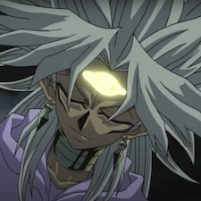 Yami with eyes closed and gold light shining out of forehead