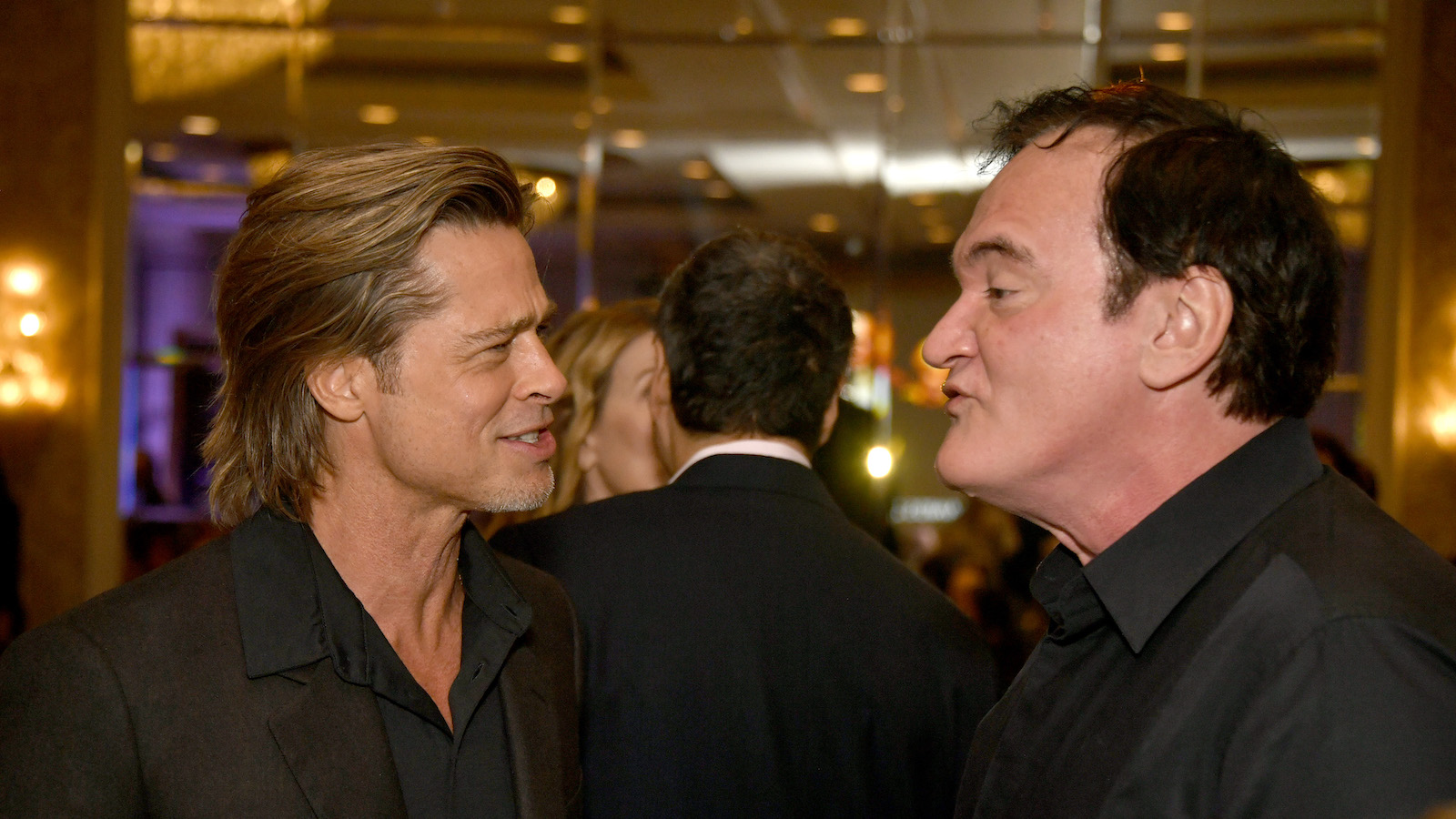 Quentin Tarantino says you can’t describe Brad Pitt, immediately before describing him