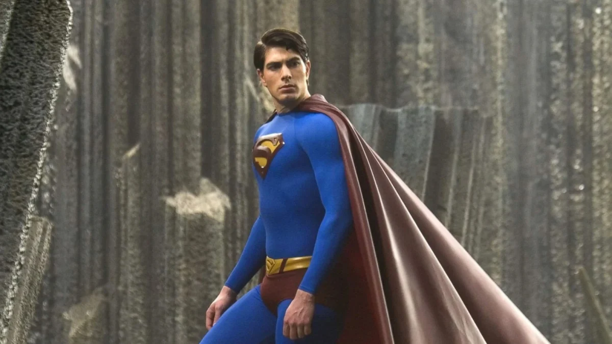 Brandon Routh stands in full Superman costume on Lex Luthor's Kryptonite island in a still from Superman Returns
