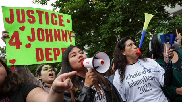 Johnny Depp supporters rally outside of a Fairfax County Court House May 27, 2022 in Fairfax, Virginia. Closing arguments in the Depp v. Heard defamation trial, brought by Johnny Depp against his ex-wife Amber Heard.