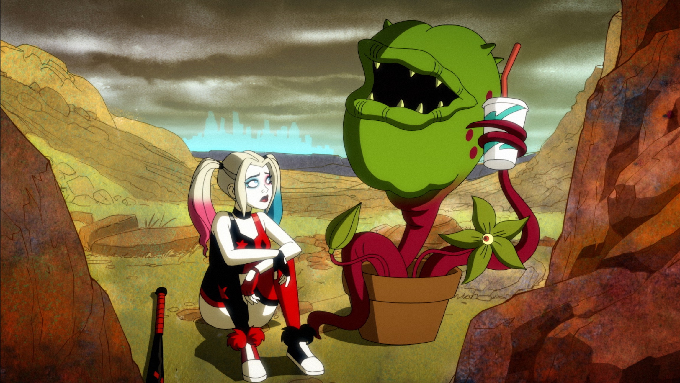 Harley Quinn is talking to a venus fly trap.