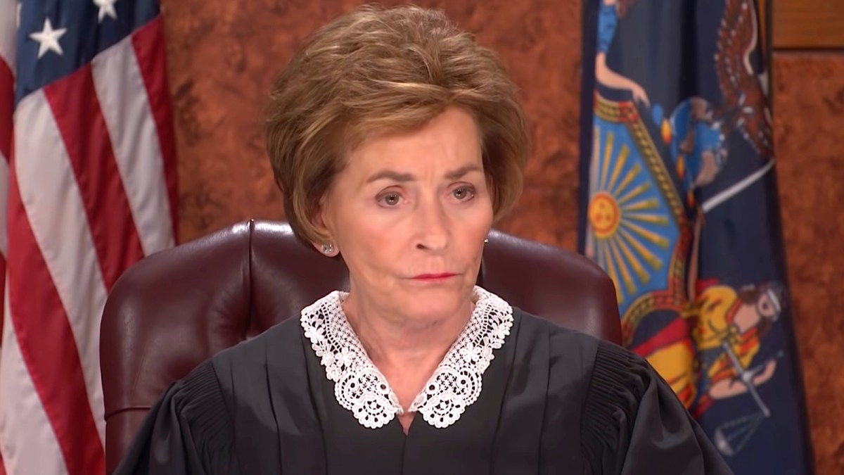 Photo of Judge Judy on the stand wearing her robes