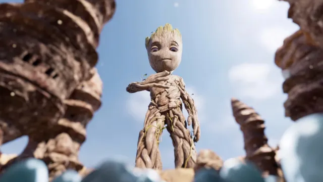 A still of Groot, holding his right hand against his chest