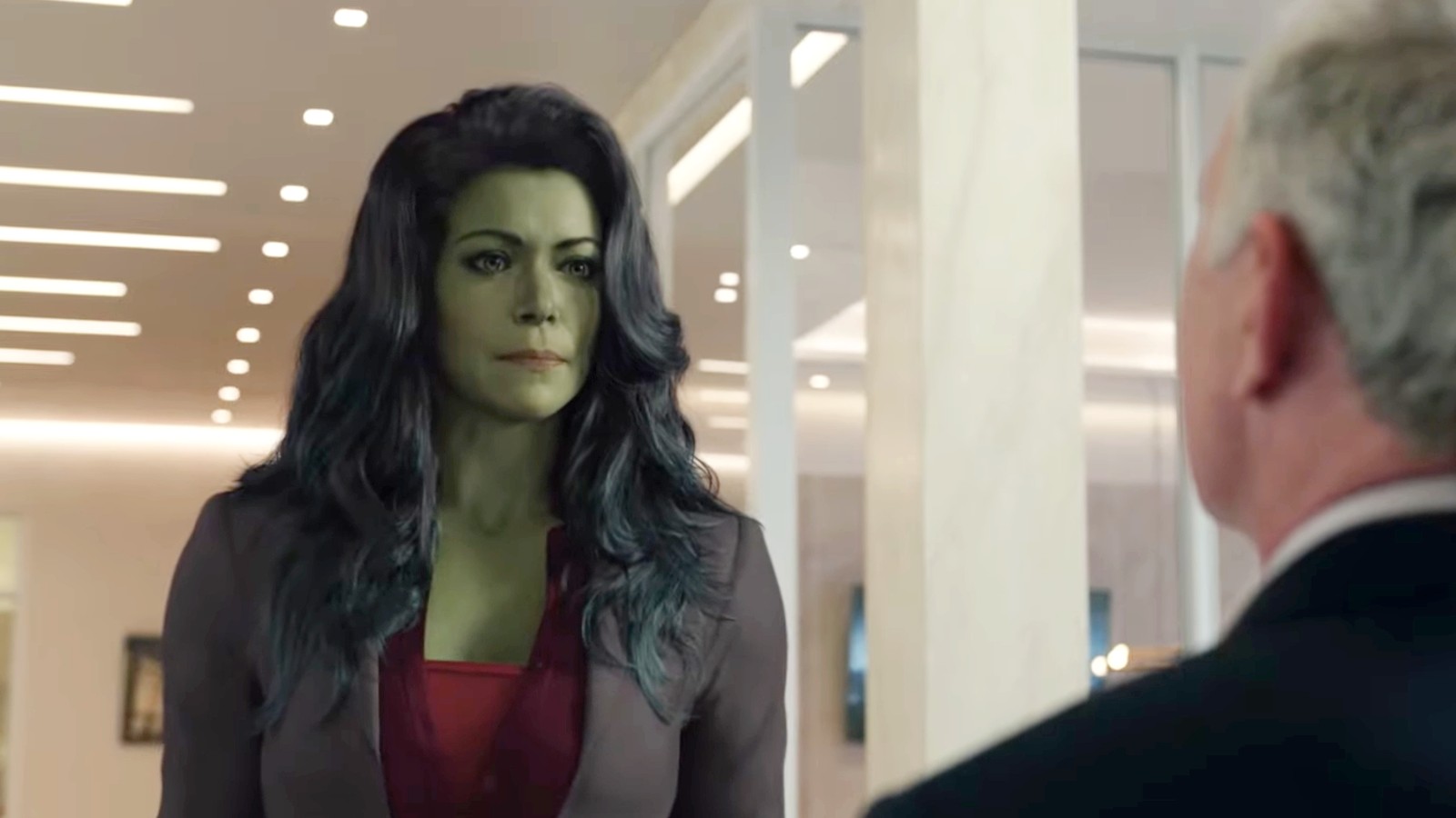She-Hulk speaks to a colleague