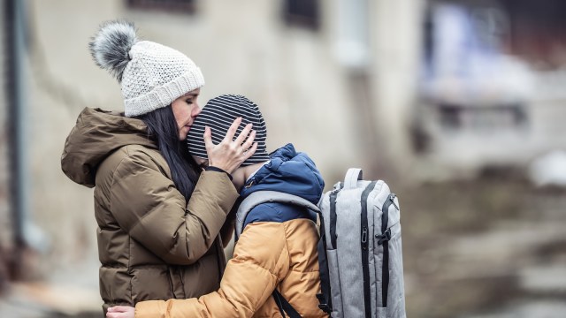 Mother kisses her son in Ukraine