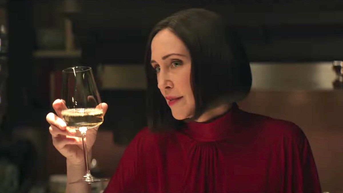 Vera Farmiga raises a glass of wine in Hawkeye