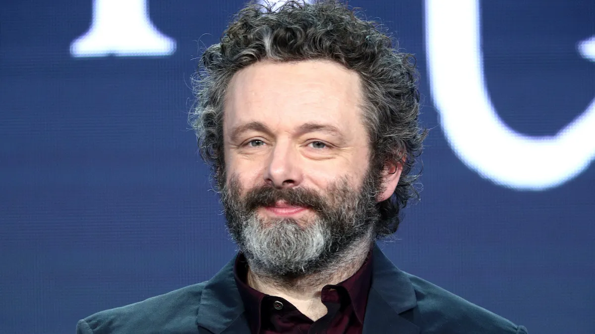 Close up of Michael Sheen smiling