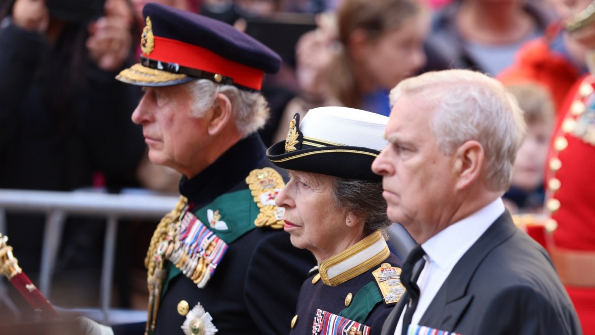 King Charles III, Princess Anne, Princess Royal and Prince Andrew, Duke of York walk behind Queen Elizabeth II's Coffin as it heads to St Giles Cathedral