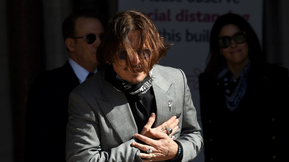 LONDON, ENGLAND - JULY 28: Johnny Depp arrives at the Royal Courts of Justice, the Strand on July 28, 2020 in London, England. The Hollywood actor is suing News Group Newspapers (NGN) and the Sun's executive editor, Dan Wootton, over an article published in 2018 that referred to him as a "wife beater" during his marriage to actor Amber Heard.