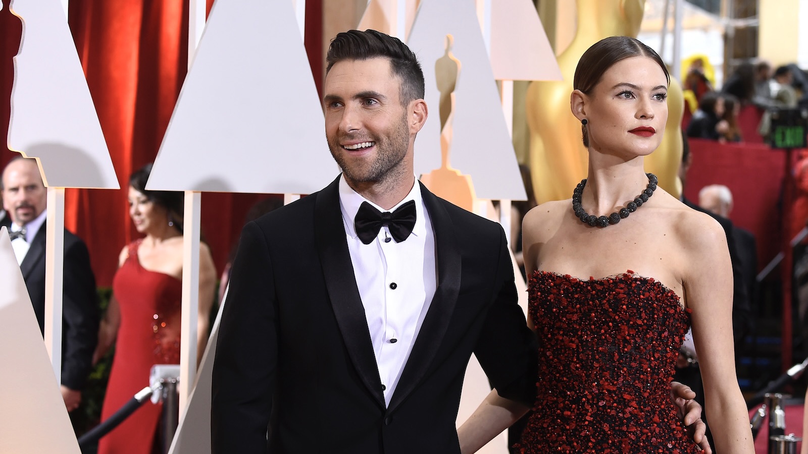 Adam Levine and Behati Prinsloo attend the 87th Annual Academy Awards at the Hollywood & Highland Center on February 22, 2015 in Hollywood, California.