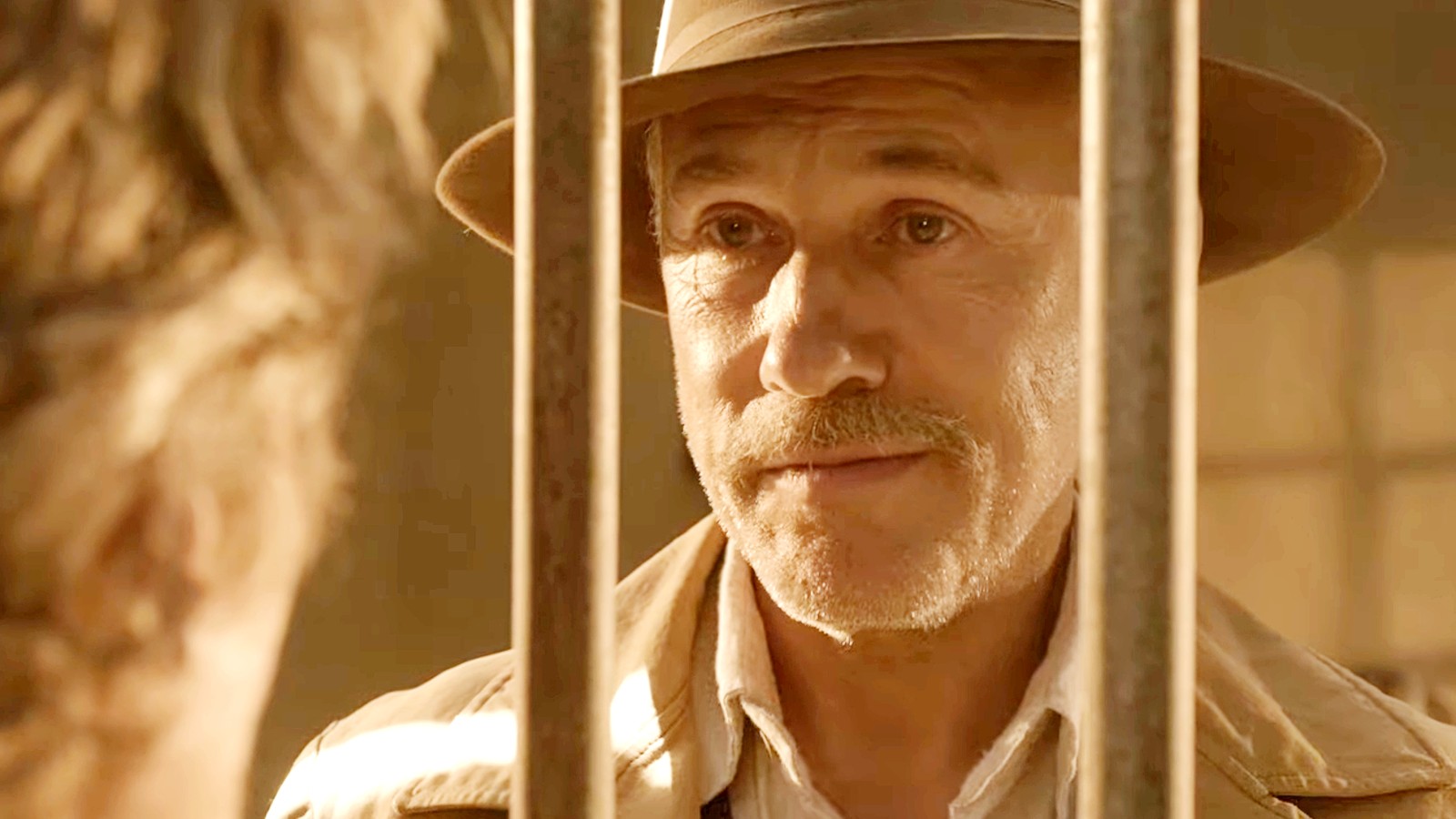 Christoph Waltz as Max Borlund behind jail bars.