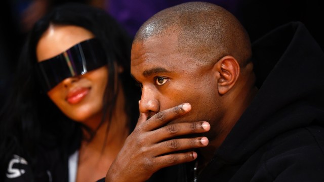 Rapper Kanye West and girlfriend Chaney Jones attend a game between the Washington Wizards and the Los Angeles Lakers in the fourth quarter at Crypto.com Arena on March 11, 2022 in Los Angeles, California.