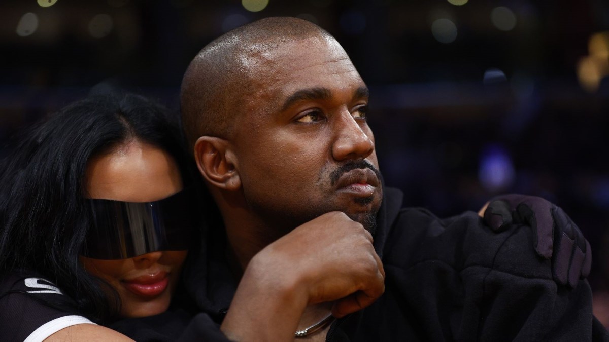 apper Kanye West and girlfriend Chaney Jones attend a game between the Washington Wizards and the Los Angeles Lakers in the fourth quarter at Crypto.com Arena on March 11, 2022 in Los Angeles, California. NOTE TO USER: User expressly acknowledges and agrees that, by downloading and/or using this Photograph, user is consenting to the terms and conditions of the Getty Images License Agreement. (Photo by Ronald Martinez/Getty Images)