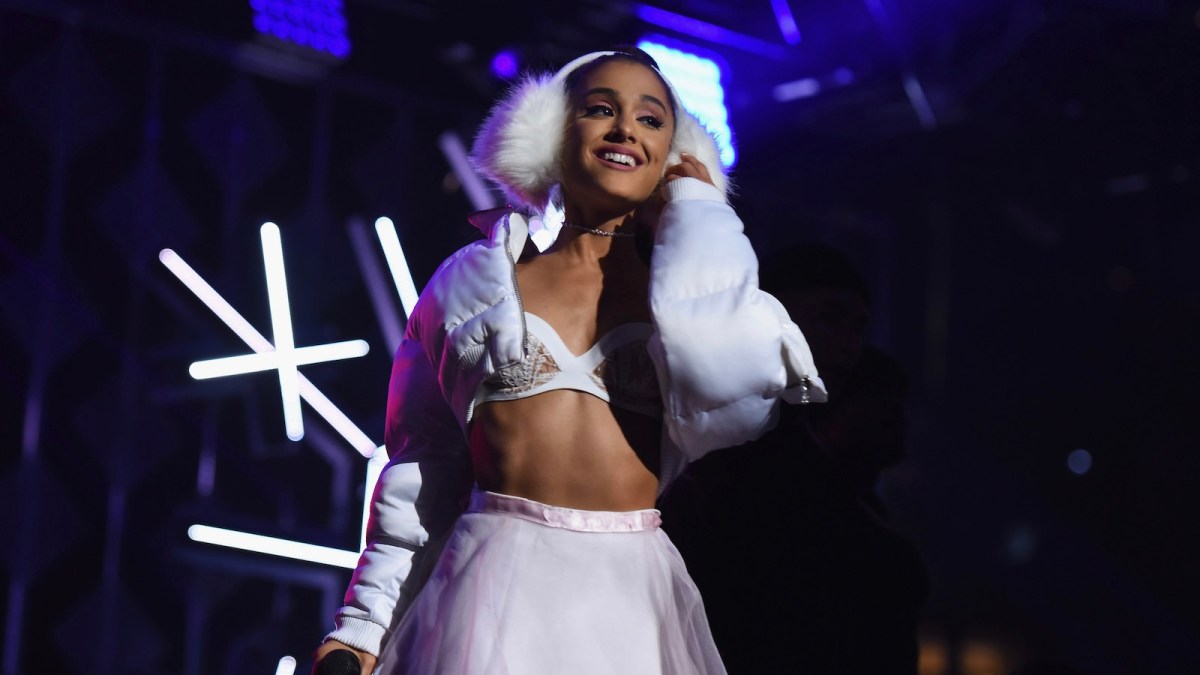 Ariana Grande performs on stage