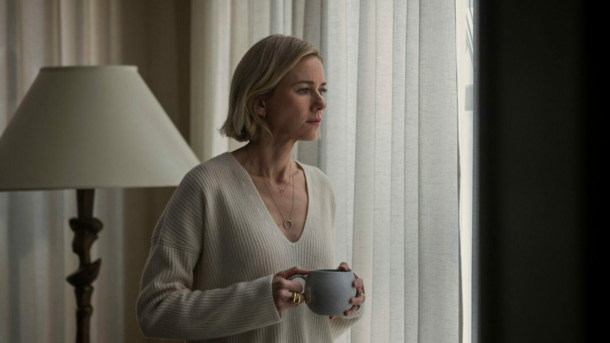 Naomi Watts looks out the window in The Watcher