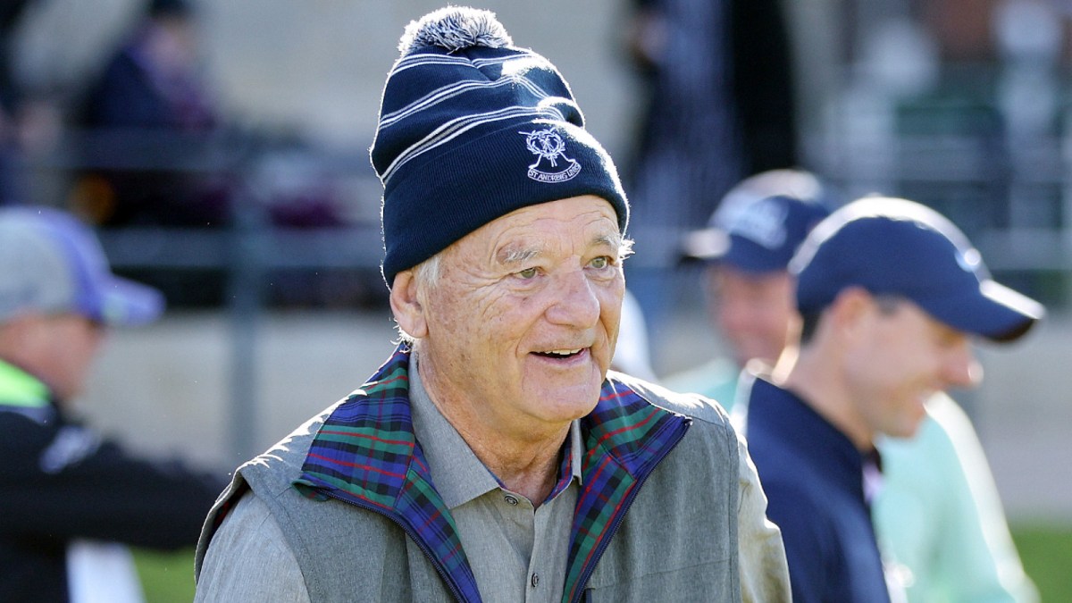 Bill Murray, the American Film Actor, looks on after shaking hands with Rory McIlroy of Northern Ireland on the tee box on the 1st hole on Day Four of the Alfred Dunhill Links Championship on the Old Course St. Andrews on October 02, 2022 in St Andrews, Scotland.