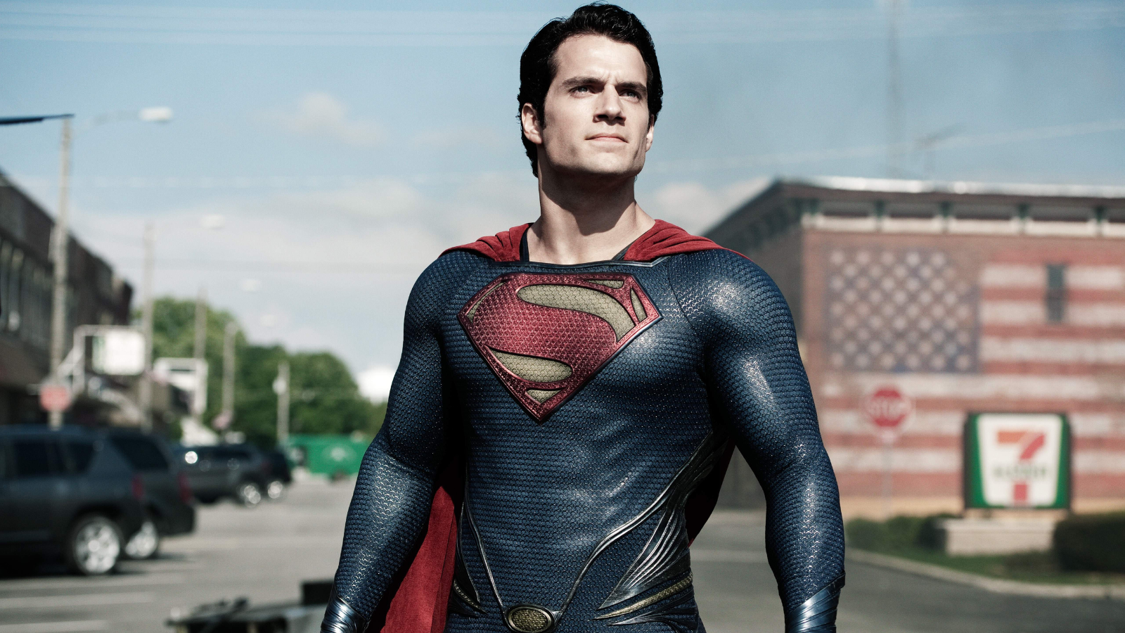 Superman (Henry Cavill) stands defiantly in the middle of a street in 'Man of Steel' (2013).