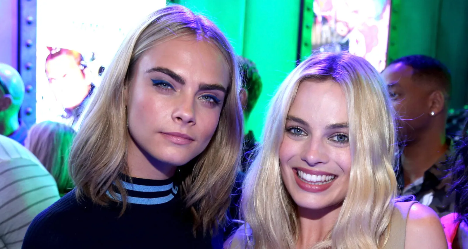 Margot Robbie and Cara Delevingne get caught up in an altercation with the paparazzi