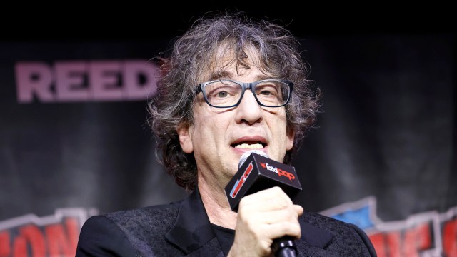 Neil Gaiman speaks onstage at the Prime Video Presents: Good Omens panel during New York Comic Con 2022 on October 07, 2022 in New York City.
