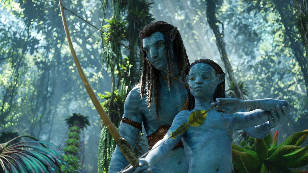 Jake Sully and one of his children in Avatar: The Way of Water