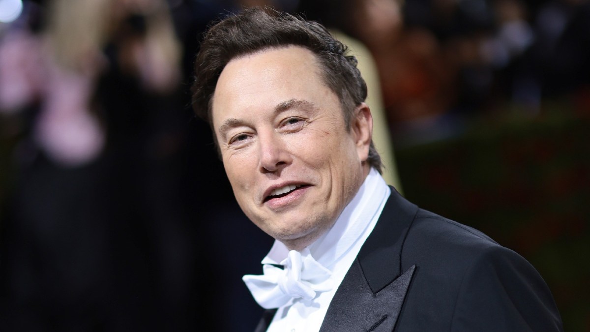 Elon Musk wears a tuxedo at a red carpet event.