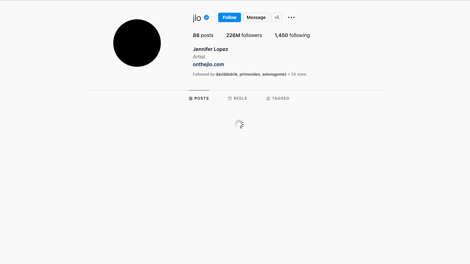 Screenshot of Jennifer Lopez's Instagram page, showing a solid black profile picture and an empty photo grid