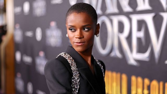 Letitia Wright in all black on the red carpet of 'Black Panther: Wakanda Forever' premiere