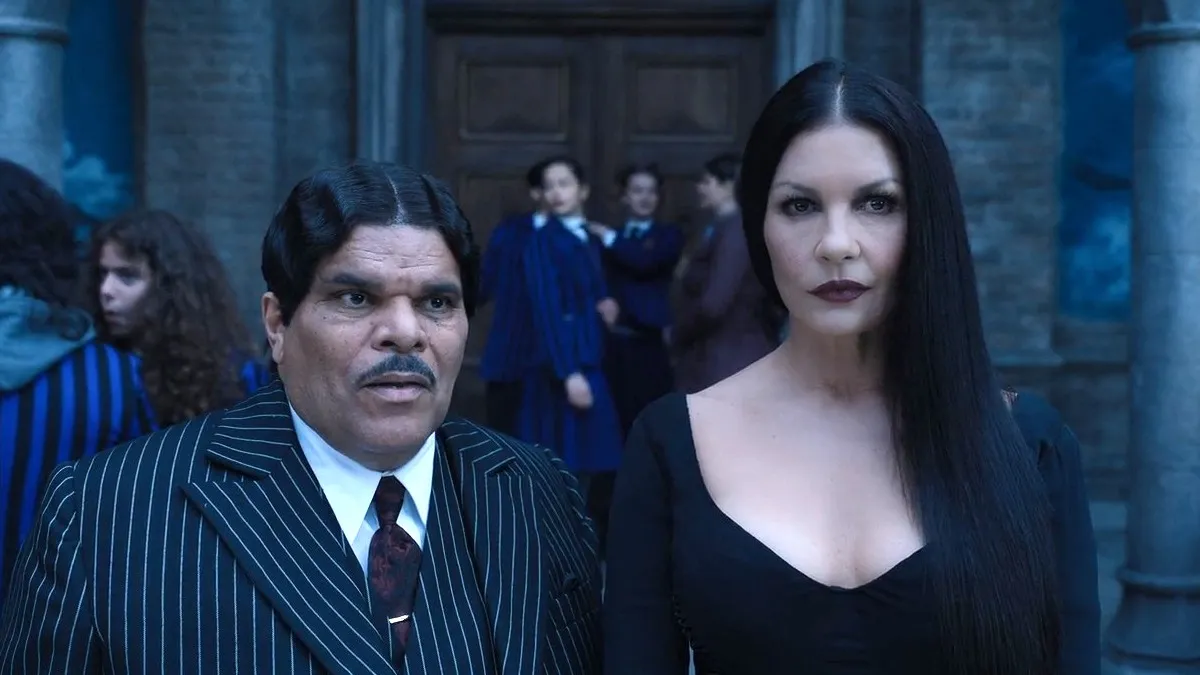 Luis Guzmán as Gomez Addams, and Catherine Zeta-Jones as Morticia Addams in 'Wednesday'