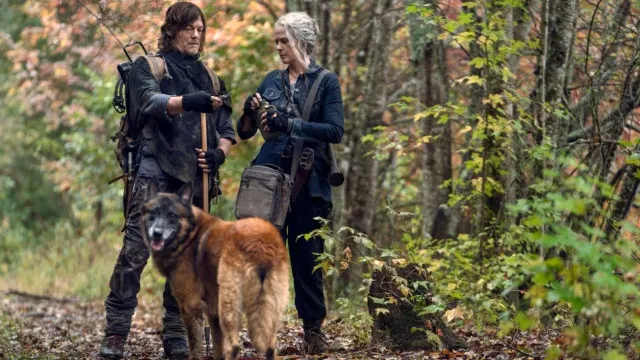 Daryl (Norman Reedus), Carol (Melissa McBride), and Dog in 'The Walking Dead'