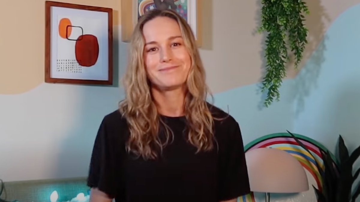Brie Larson smiling at the camera in her YouTube video