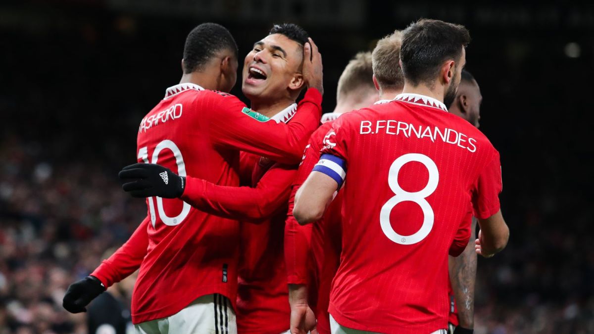 Marcus Rashford of Manchester United celebrates with Casemiro after scoring his side's second goal during the Carabao Cup Fourth Round match between Manchester United and Burnley at Old Trafford on December 21, 2022 in Manchester, England. (Photo by James Gill - Danehouse/Getty Images)