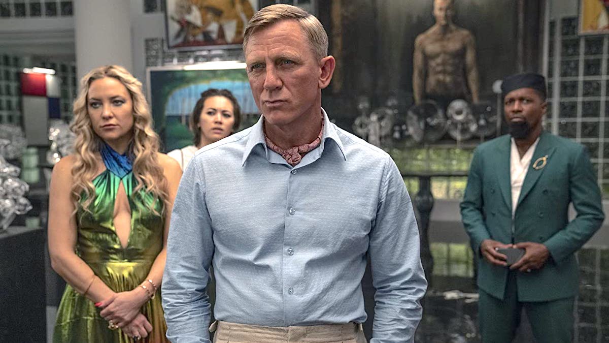 Kate Hudson, Daniel Craig, Leslie Odom Jr., and Jessica Henwick as Birdie Jay, Benoit Blanc, Lionel Toussaint, and Peg in 'Glass Onion: A Knives Out Mystery'