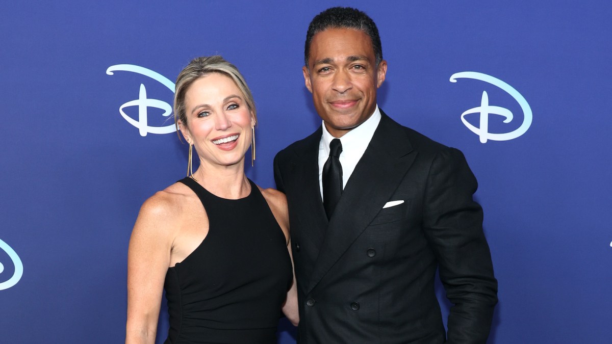 Amy Robach and TJ Holmes from 'Good Morning America' posing together on the red carpet