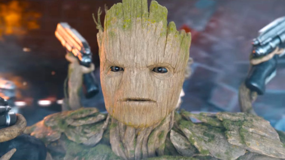 A photo of Groot scowling as he fires multiple guns from in Guardians of the Galaxy Vol. 3