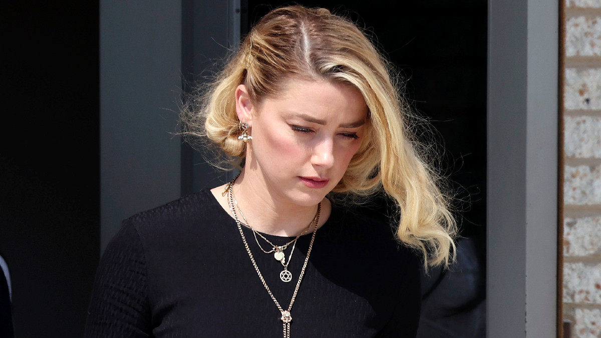 Actress Amber Heard departs the Fairfax County Courthouse on June 1, 2022 in Fairfax, Virginia. The jury in the Depp vs. Heard case awarded actor Johnny Depp $15 million in his defamation case against Heard.