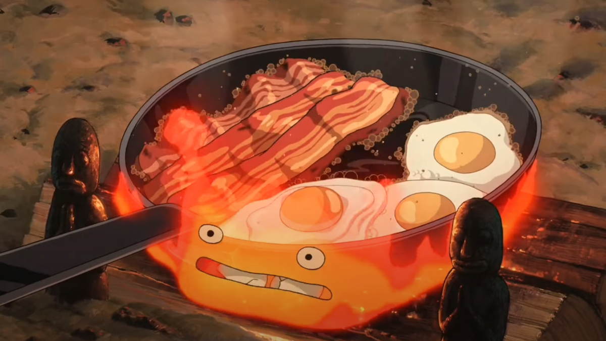 Calcifer eats egg shells while making breakfast. 